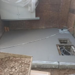 cement laid with manhole covers.