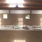 plastering wall in warehouse