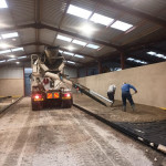 laying concrete floor in warehouse
