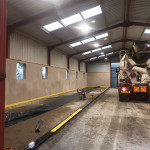 laying concrete floor in warehouse